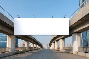 Obraz premium Long white empty signboard hanging on concrete urban bridge for commercial information and advertise message