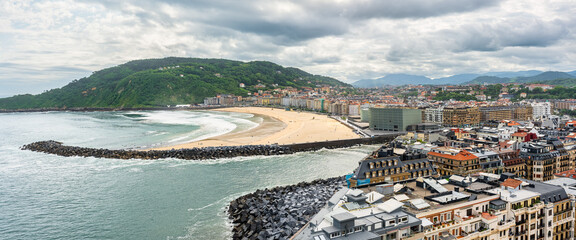 Beautiful view of the city of San Sebastian with Zurriola beach in the foreground, Basque Country.