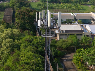 Communication tower top. Radio antenna Tower , microwave antenna tower on light sky background....