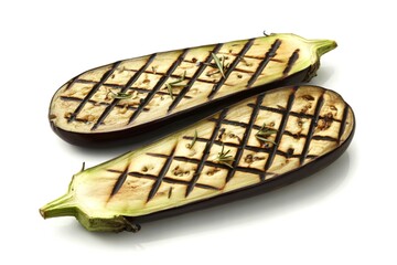 two perfectly grilled eggplant halves