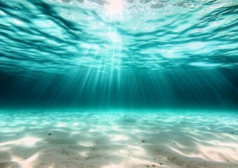 Underwater background deep blue sea and beautiful light rays with sandy floor