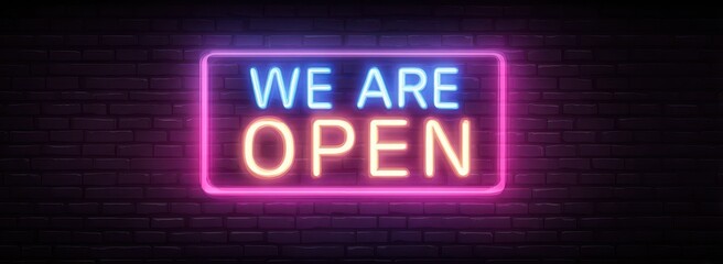 Neon sign, "We Are Open," on brick wall