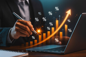 Businessman analyzing financial growth with a rising bar chart and percentage symbols