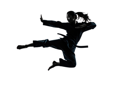 Female martial artist performing dynamic flying kick in silhouette demonstrating karate or taekwondo technique on transparent background