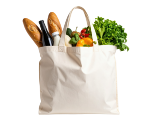 Canvas tote bag filled with fresh groceries and vegetables on transparent background for eco-friendly shopping and sustainable lifestyle concepts.