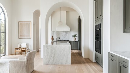 A modern kitchen and living area with arched doorways.