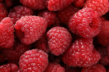 fresh raspberries on background, close up