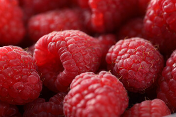 fresh raspberries on background, close up