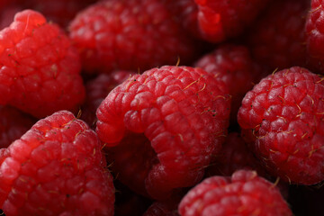 fresh raspberries on background, close up