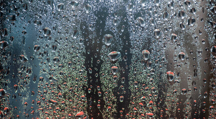 Water drops on a window glass. Water drops on the glass.