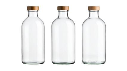 Set of three empty glass bottles with different textures and designs against a transparent background isolated on transparent surface
