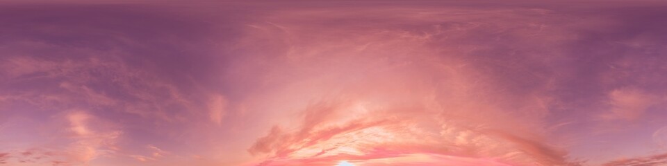Seamless 360 HDR spherical panorama of sunset sky with vibrant pink Cirrus clouds. Full zenith or...