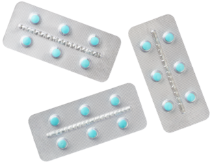 Blue pills in the plastic blister, isolated on white background, top view.