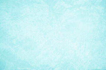 Pastel blue and white concrete stone texture for background in summer wallpaper. Cement and sand wall of tone vintage. Concrete abstract wall of light cyan color, cement texture mint green for design.