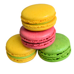 Three colorful macarons creating a delightful pyramid, featuring a vibrant yellow macaron on top of a pink and green base, all set against a transparent background