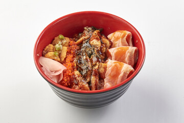 Bowl of Japanese kaisen don featuring fresh salmon slices, marinated seafood, fish roe, pickled ginger, and rice, presented in red bowl with black base. dish is vibrant and appetizing
