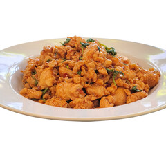 Deliciously Spicy Stir-fried Chicken with Holy Basil in a White Plate