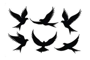Obraz premium Silhouette Birds in Flight: A striking black silhouette of several birds in flight, captured against a clear backdrop, perfect for design. The birds appear to be soaring effortlessly through the air.