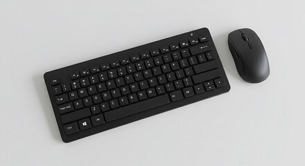 Sleek Black Wireless Keyboard and Mouse on White Surface