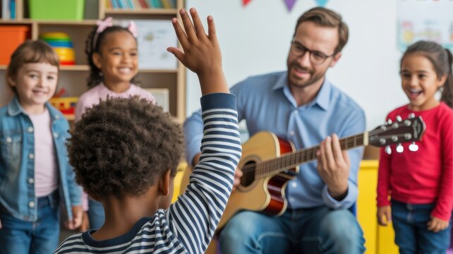 Male music teacher engages diverse children in classroom guitar lesson