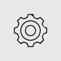 Simple black outline gear icon with concentric circles inside on a light gray background
