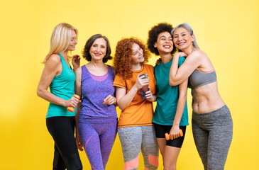 Group of different kind of women with different body, age, and ethnicity making sport