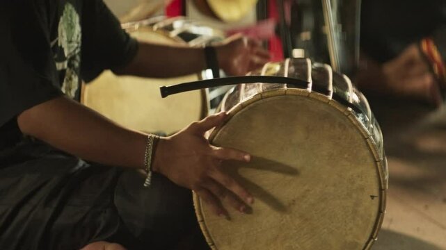 Close-Up of Hands Playing a Traditional Makassar Drum &ndash; Indonesian Cultural Percussion Performance