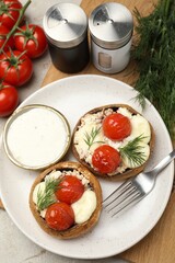 Tasty stuffed mushrooms served on light table, flat lay