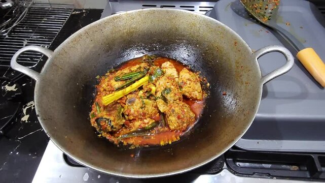pan fried chicken,Skipjack tuna woku ,Fish woku a typical fish dish from Manado ,North Sulawesi,Woku is an Indonesian type of bumbu or spice mixture found Manado cuisine,authentic Manado sauce