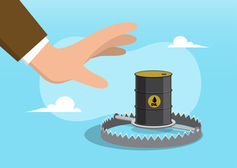 A hand reaching toward an oil barrel placed inside a metal trap