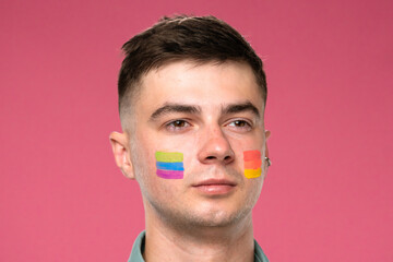 Person Portrait with Painted Face on Pink Background