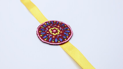 Beautiful and unique handmade rakhi with 3d liner design on felt sheet and ribbon