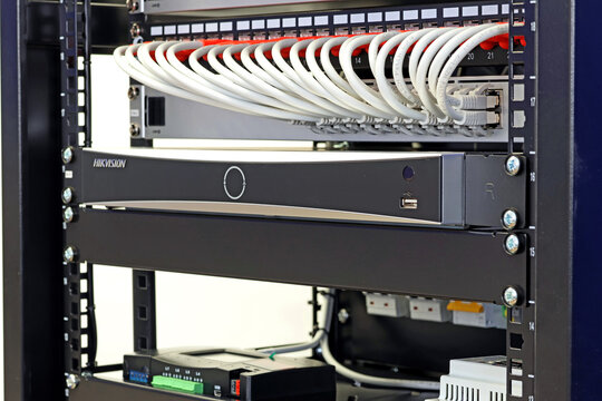 Cabeus low-current equipment rack in the apartment. Ubiquiti Ethernet switches, VSSL amplifiers, Hikvision DVR. Uninterruptible DKC power supply. 