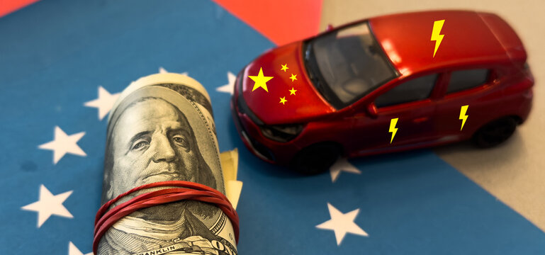 notes on a European union flag background. Taxes for chinese electric cars import in Europe Union. EU and China trade, tariffs war