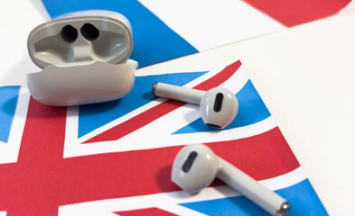 Headphones on the background of the flag of Great Britain