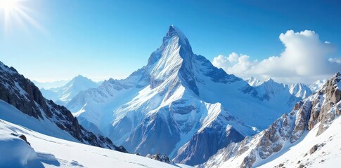 Obraz premium Majestic snowcapped mountain peak piercing a vibrant blue sky, sunlight illuminating pristine snow and rocky slopes A breathtaking winter landscape scene , majestic, alpine