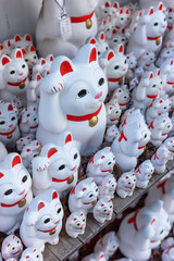 Maneki-neko Figurines at Gotokuji Temple, Tokyo – Symbols of Good Fortune