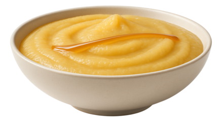 Wide, shallow bowl of apple puree with a thin drizzle of honey across the top.