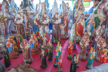 Fototapeta premium Catholic Religious shop with lots of saint Jesus and Virgin Mary statue