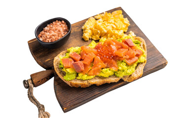 Bruschetta with salry salmon, trout slices, avocado and red caviar isolated on white background