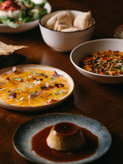 Different dishes on a restaurant set table for dinner