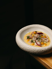 Salad in a white bowl from a restaurant