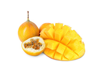Fresh juicy mango cut in cubes and passion fruits isolated on white