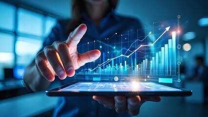 Analyzing business growth charts and financial data on a tablet, illustrating positive trends with rising graph lines and bar charts.