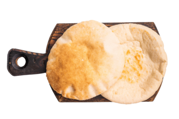 A stack of pita breads isolated on white background. top view