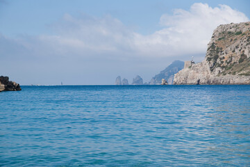 Fototapeta premium Ieranto bay on the Amalfi Coast in front of the Capri faraglioni, Southern Italy