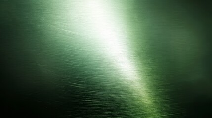 Abstract green metallic texture with light streaks.