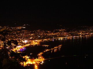 Night aerial view of Turkish city with glowing city lights