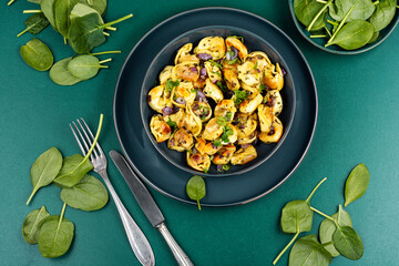 Vegan spinach ravioli or dumplings.