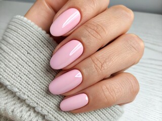 Hand with pink manicure